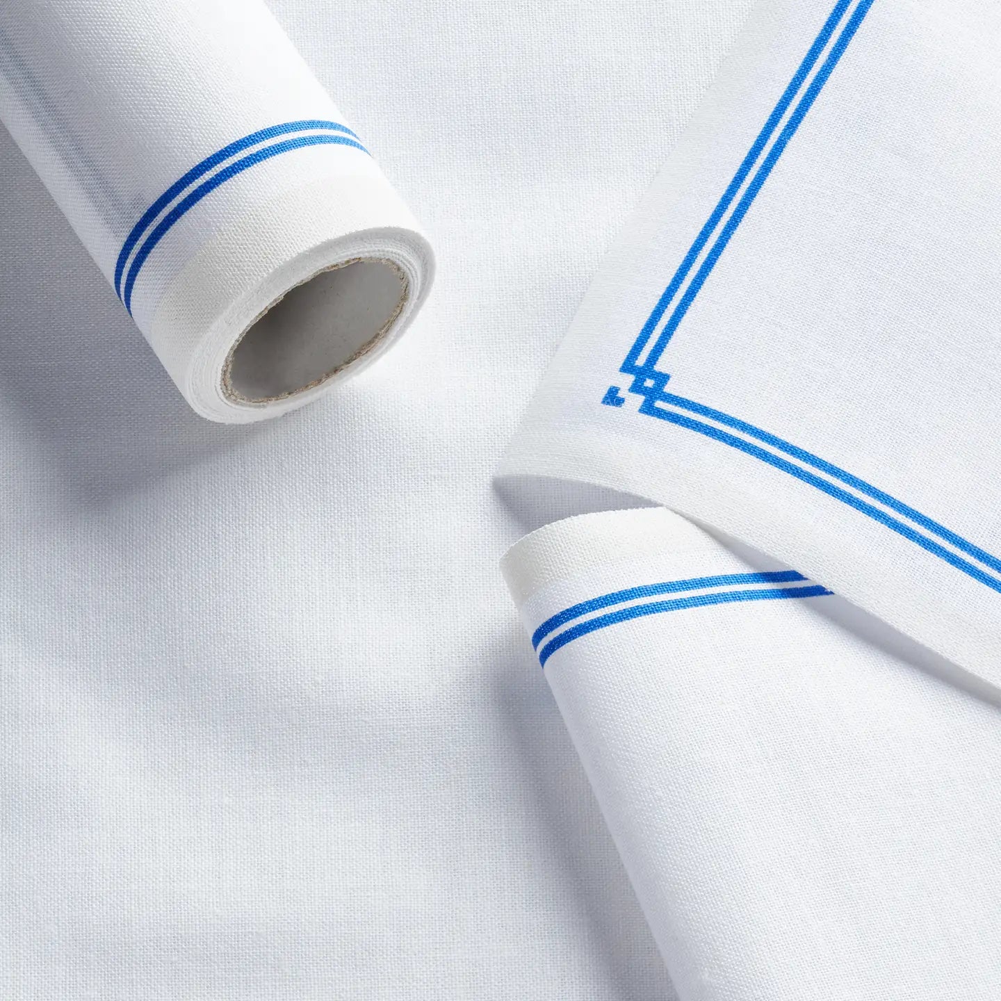 Blue Bordered Roll of Reusable Cocktail Napkins